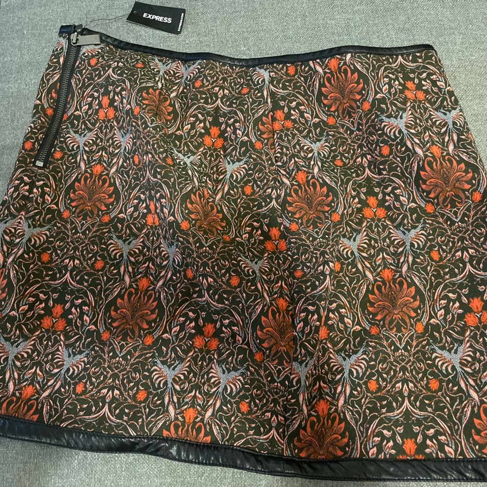 Express zip up with leather trim skirt